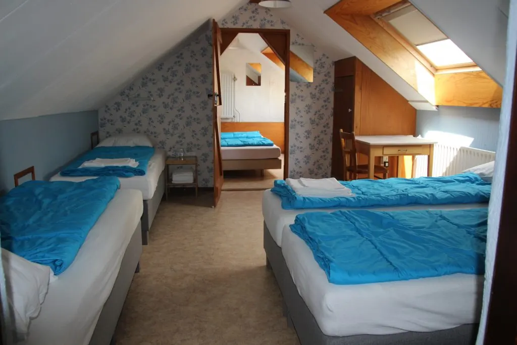 Een slaapkamer onder de kap in De Wingerd